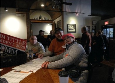 Chairman Bloom, Timothy Patric, and Samm
Tittle enjoy lunch and plan events after the
rally.